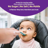 Baby being spoon-fed with text promoting starting solids, millets, and no sugar, salt, or maida.